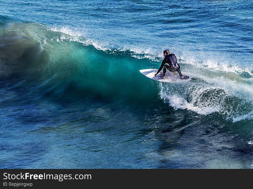 Man in White Surfboard