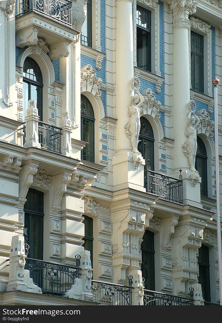 White Wall Statue on High Rise Building