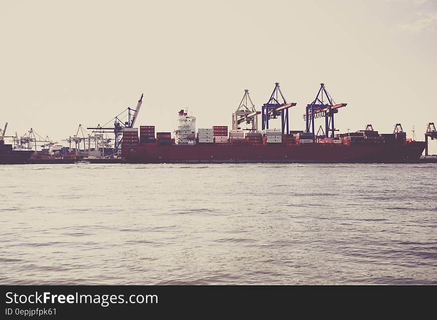 Red Ship on the Sea during Daytime