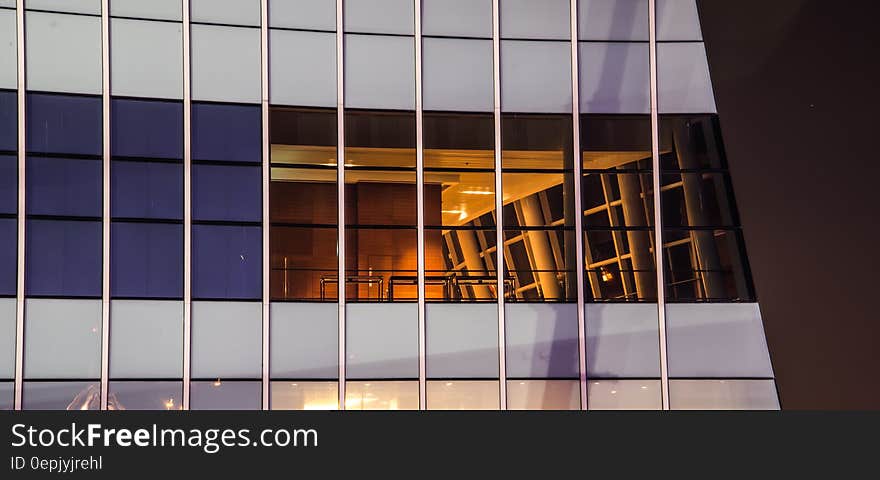 White and Blue Glass Window High Rise Building