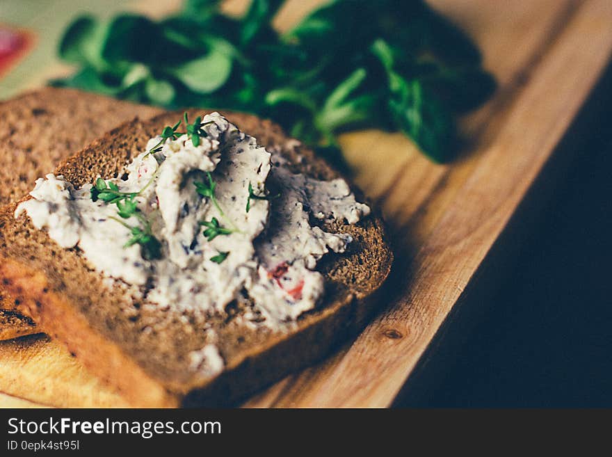 Bread With Ravioli Toppings on Brown Table