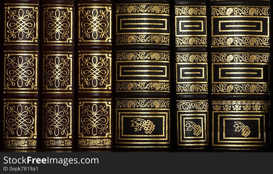 Black and Golden Stacked Book