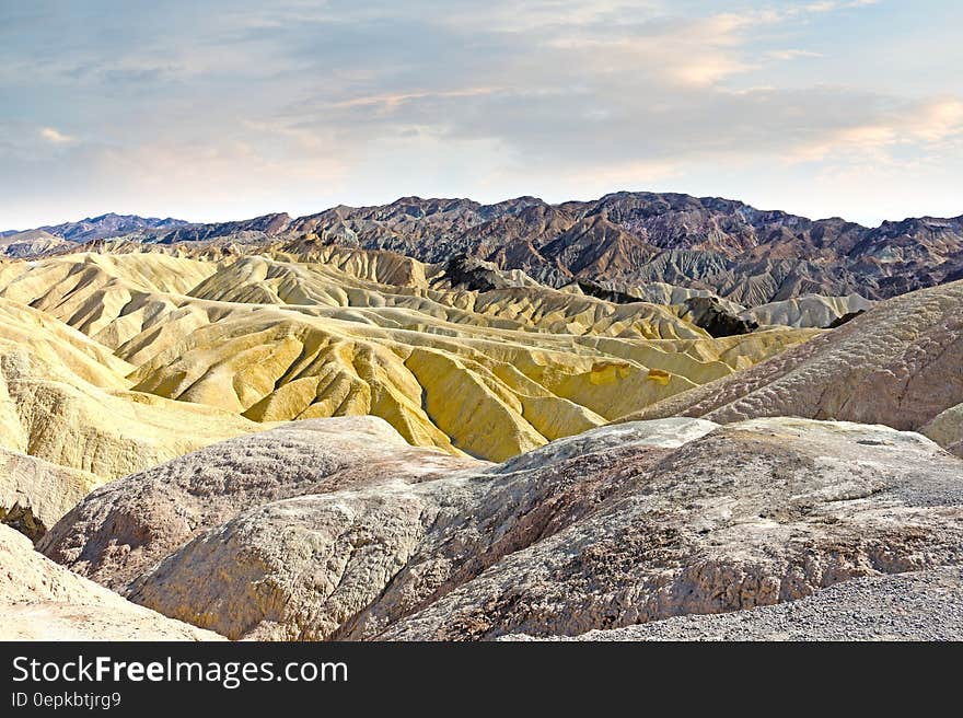 Gray Beige and Brown Rocky Mountain during Daytime