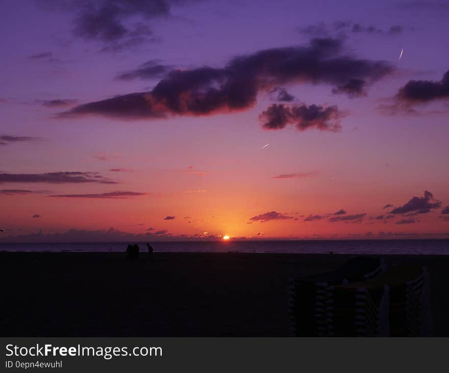 Sunset in purple skies over ocean horizon. Sunset in purple skies over ocean horizon