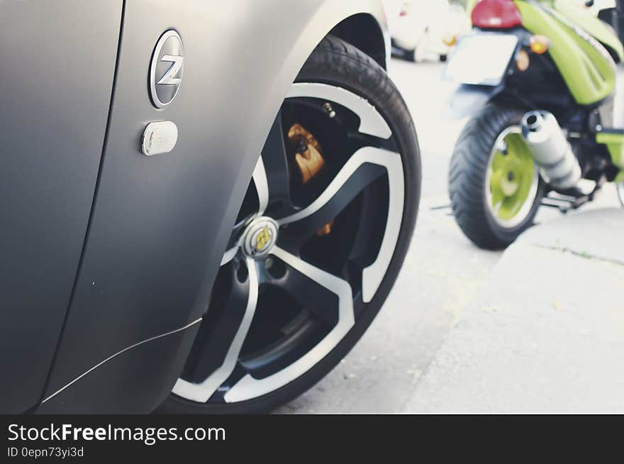 A close up of a Nissan Z series car on street.