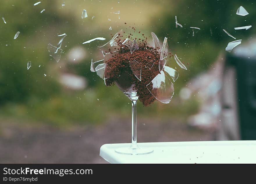 An exploding crystal glass in freeze frame. An exploding crystal glass in freeze frame.