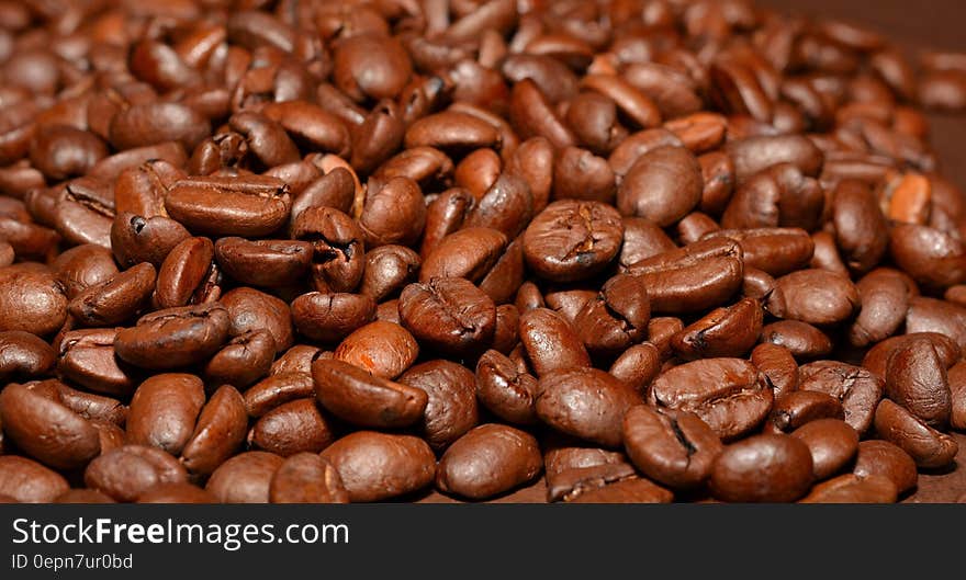 A pile of roasted coffee beans.