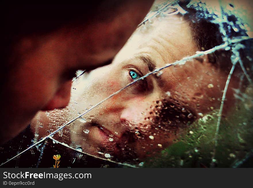 Blue Eyed Man Staring at the Mirror