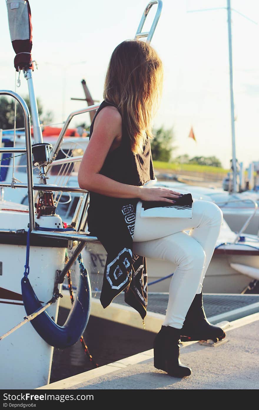 Girl sitting on the boat