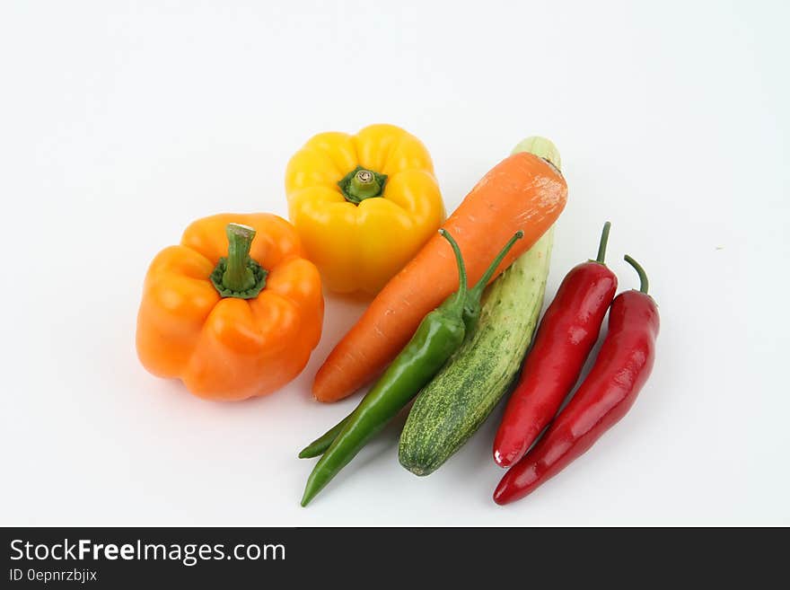 Different vegetables on a white background.