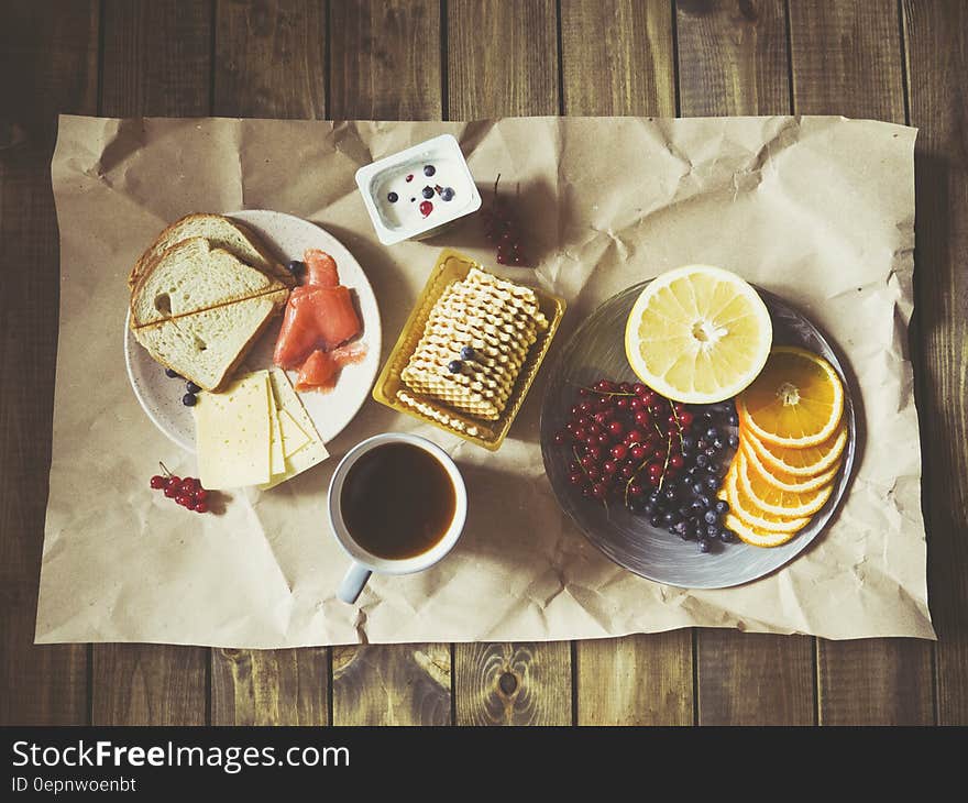 Orange Cookies and Bread on Table