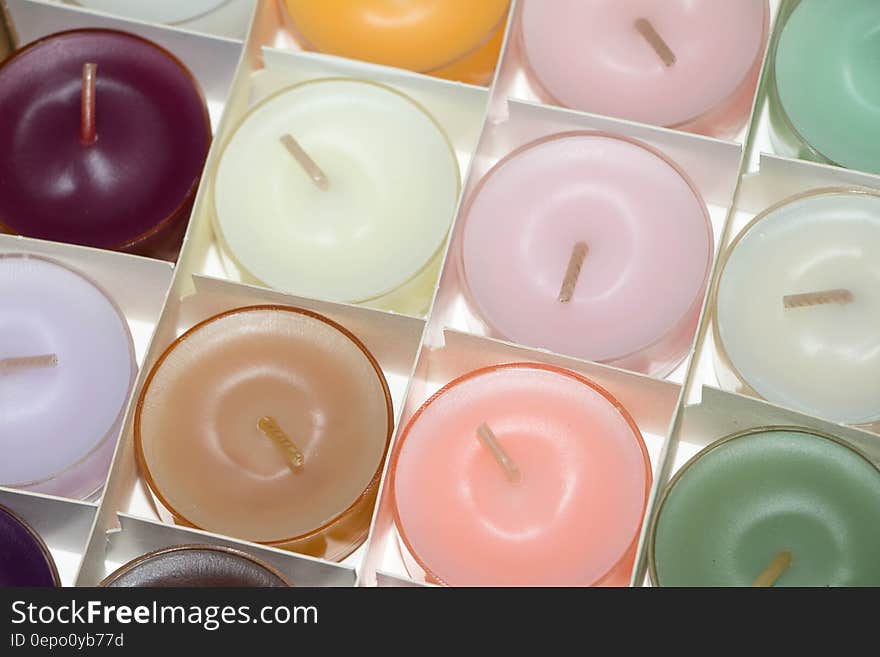 Box of colorful tea candles. Box of colorful tea candles.