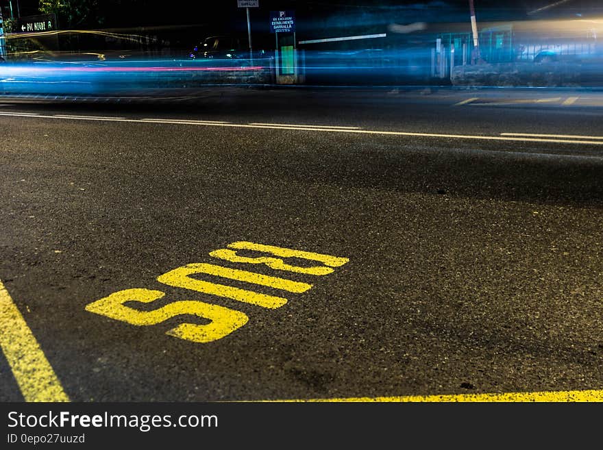 Yellow and Black Concrete Road