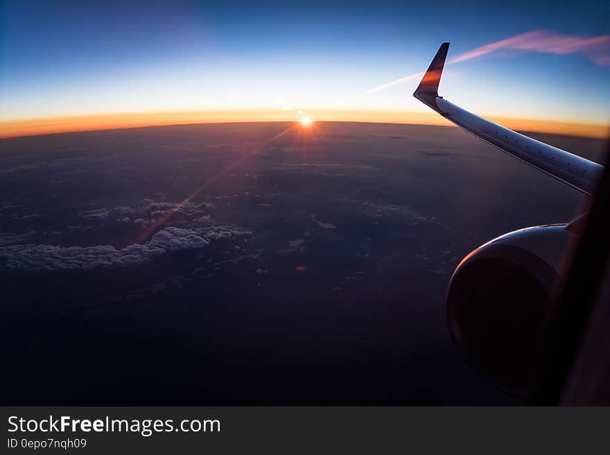 Aerial View of White Clouds during Sunset