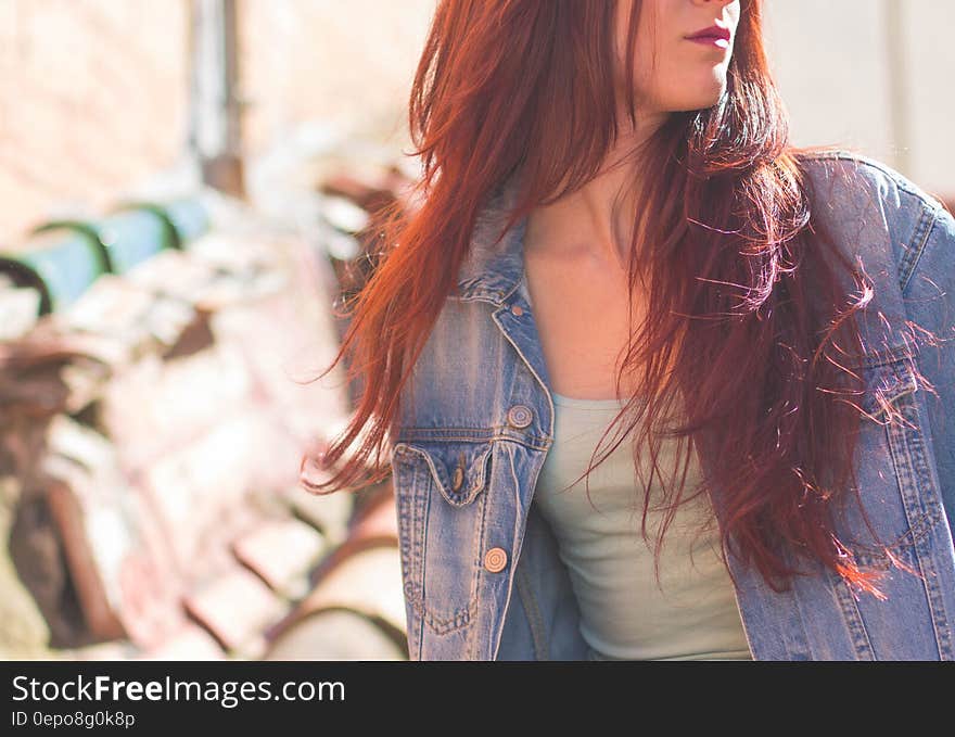 Woman Wearing Blue Denim Jacket and Grey Shirt