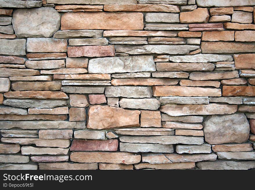 Wall with multi-coloured stones. Wall with multi-coloured stones.