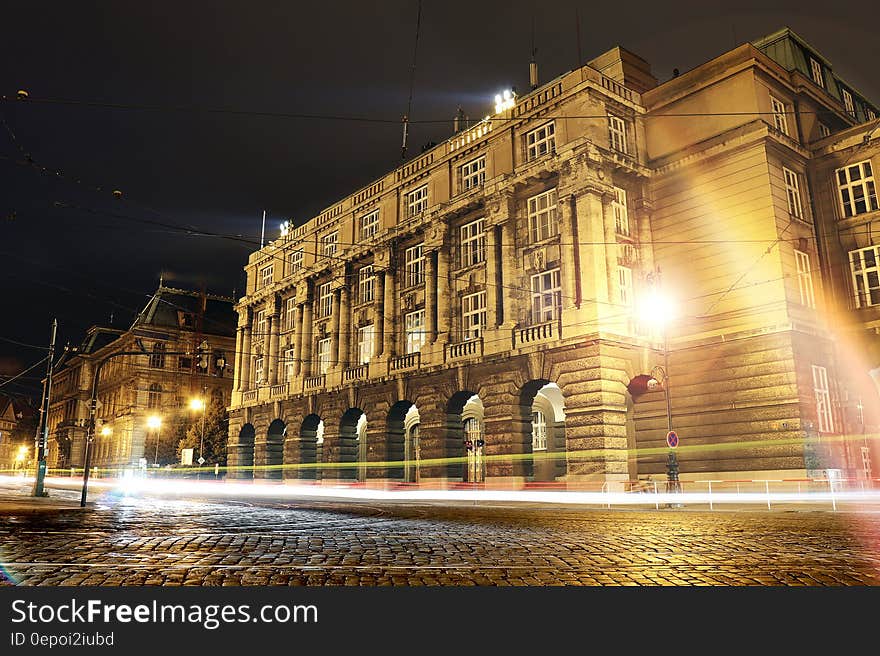 A long exposure in the city night with light trails from cars. A long exposure in the city night with light trails from cars.