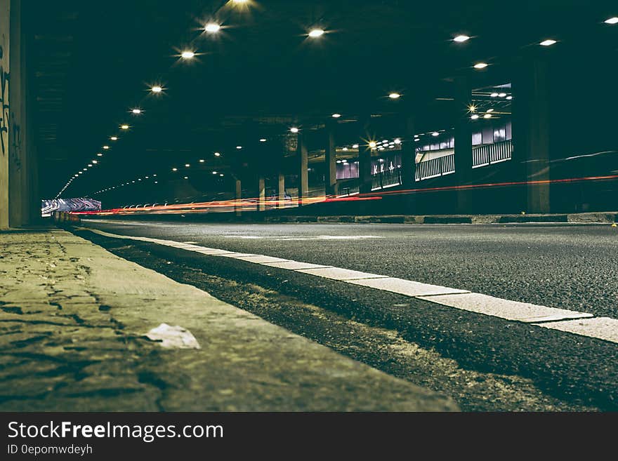 A long exposure of a street with car lights. A long exposure of a street with car lights.