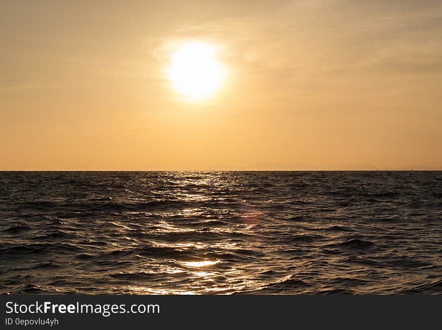 Gray Rippling Sea Water during Dusk