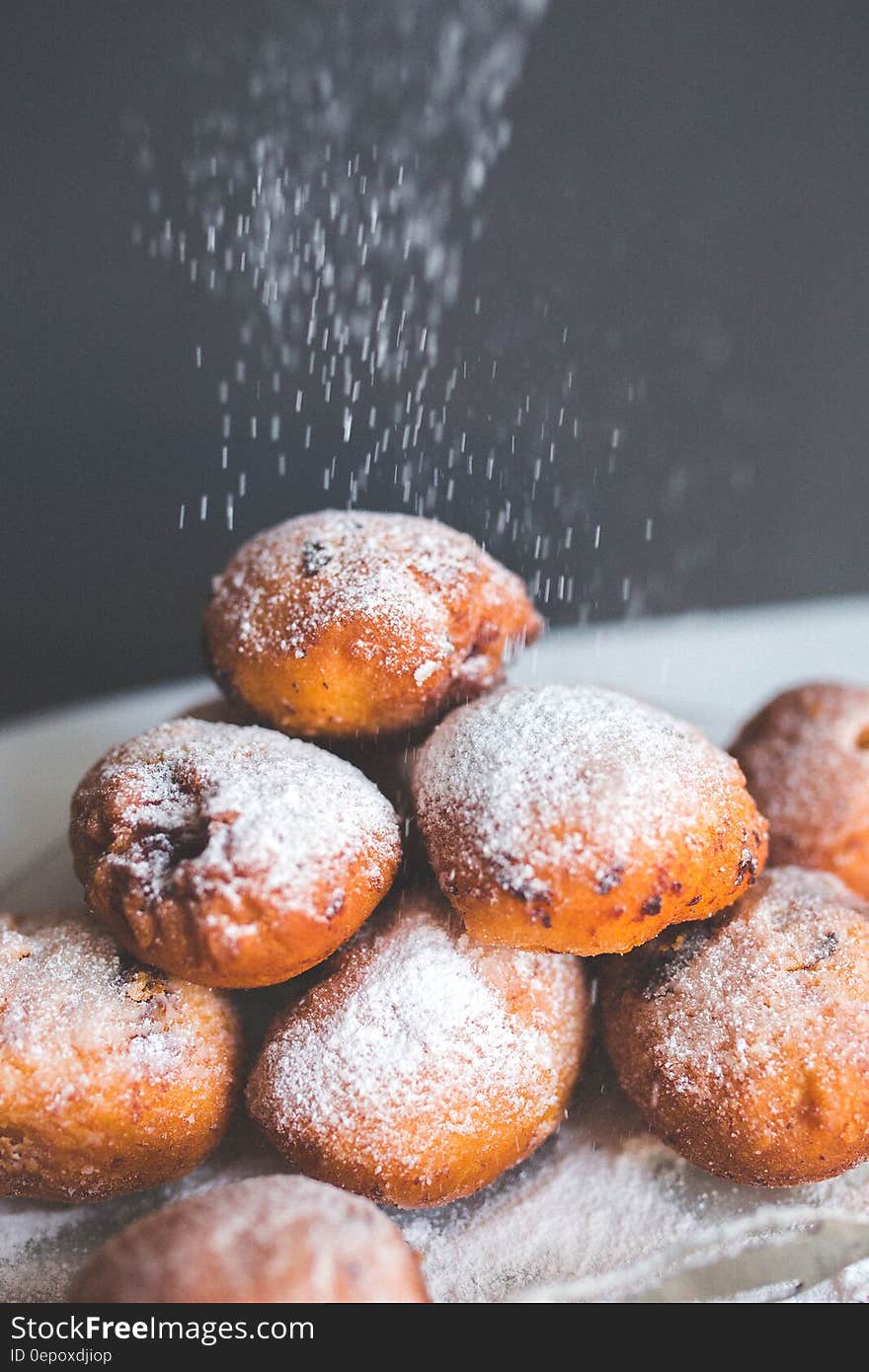 Falling powder sugar on donuts