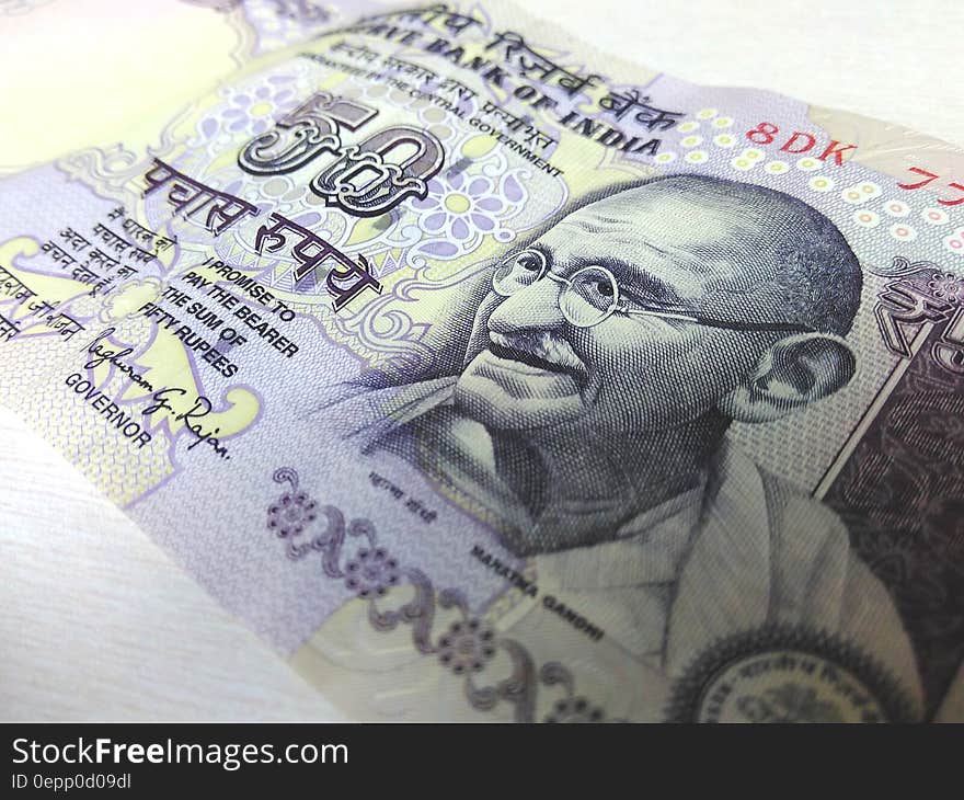 Close up of Mahatma Gandhi portrait on Indian 50 Rupee banknote. Close up of Mahatma Gandhi portrait on Indian 50 Rupee banknote.