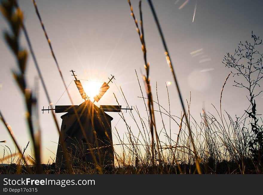 Silhouette of Windmill during Daytime