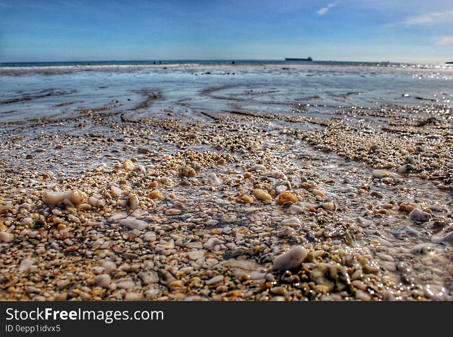 Stones by the Seashore during Day