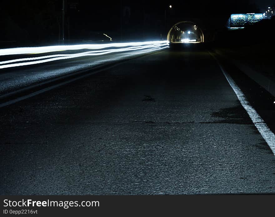 Gray Concrete Road during Night Time