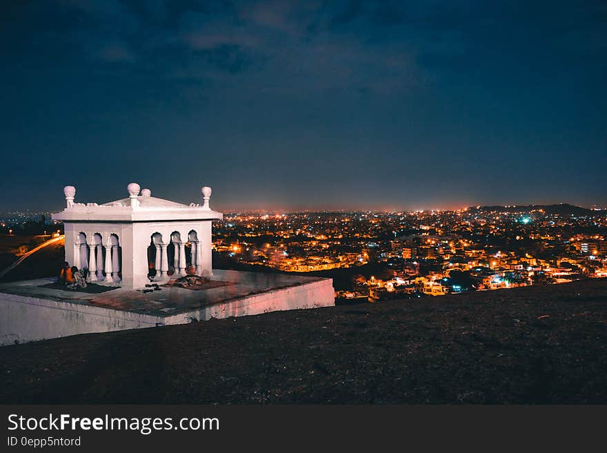 White House on the Roof Deck With City Skyline View during Night Time