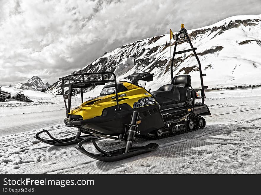 Yellow and Black Snowmobile