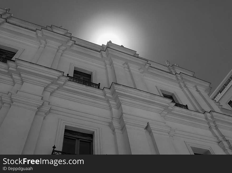 Worm&#x27;s Eyeview of White Concrete Building Under Sunny Clear Sky