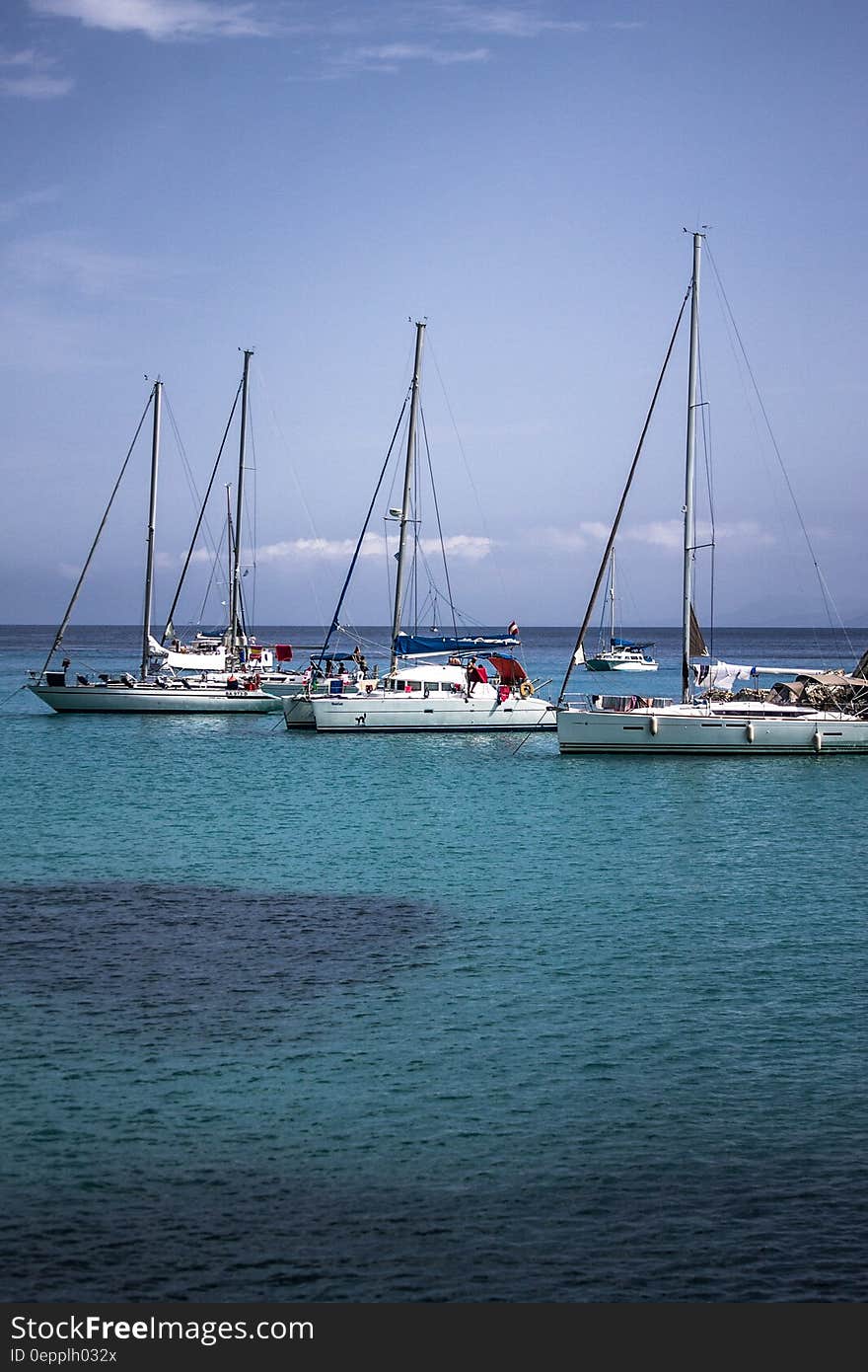 White Boat on Sea during Daytime