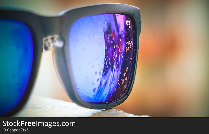 Bubbles Reflected on Lens of Black Framed Sunglasses