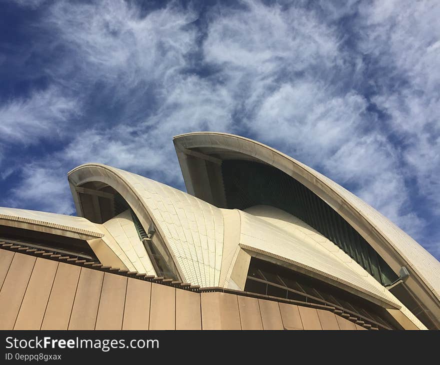 White Roof Under White Cloud and Blue Sky during at Daytime