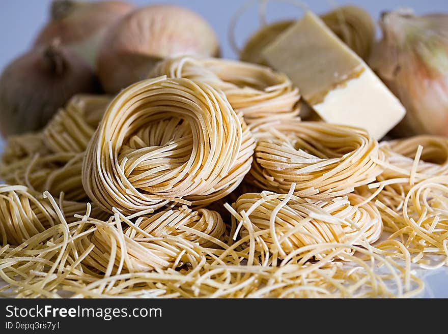 Yellow Pasta Beside Onions