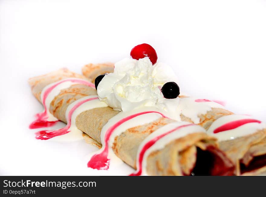 Cherry and Whipped Cream Topped Crepe