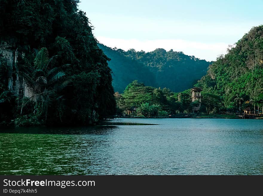 Stone cliffs rising from the water. Stone cliffs rising from the water.