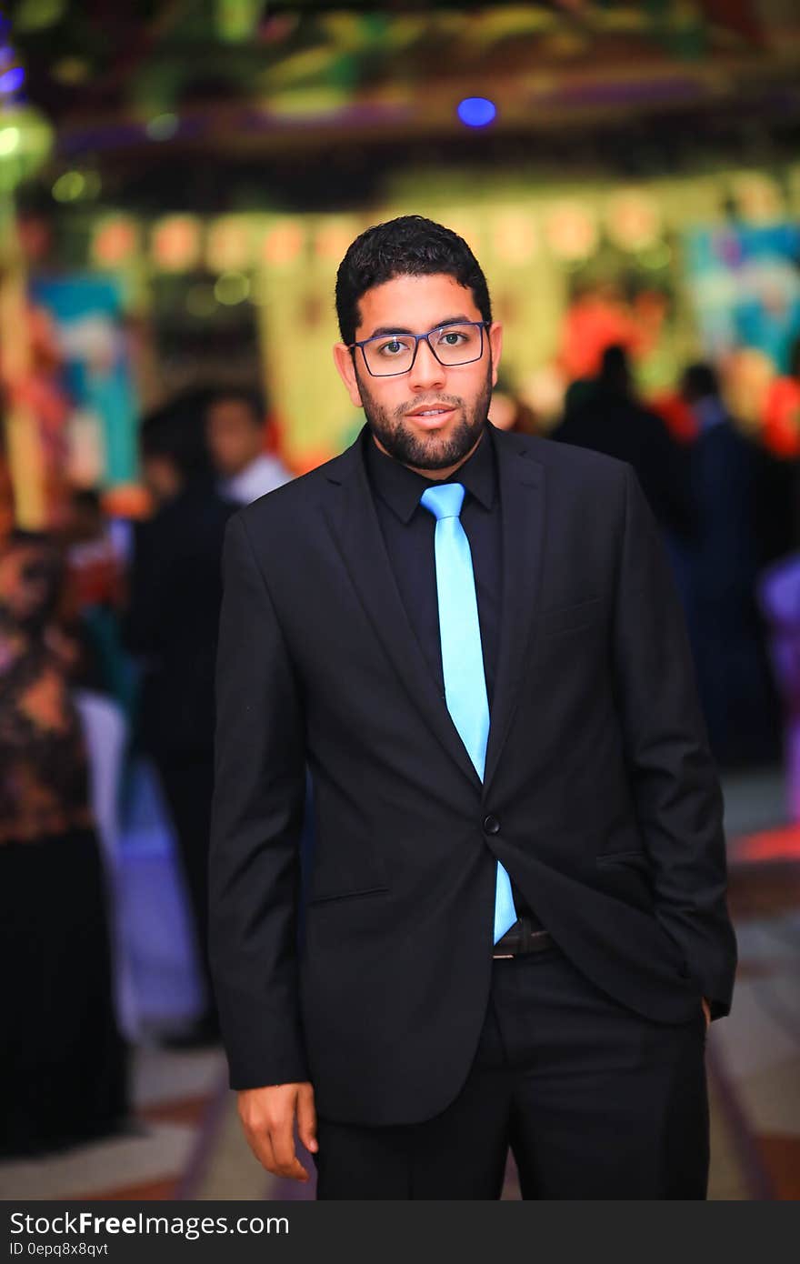 Portrait of businessman in suit standing on city streets. Portrait of businessman in suit standing on city streets.