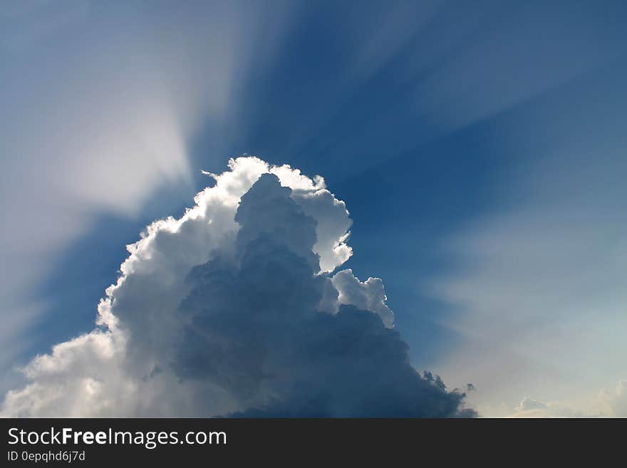 Sun Covered by White Clouds Showing