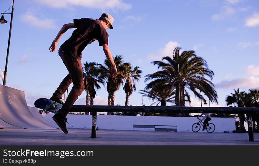 Man Playing Skateboard during Daytime