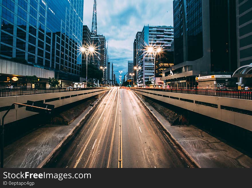 Grey Highway Between High Rise Building