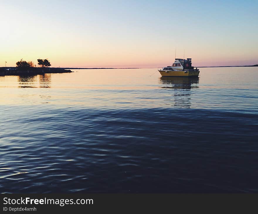 A boat at the sea at dusk. A boat at the sea at dusk.