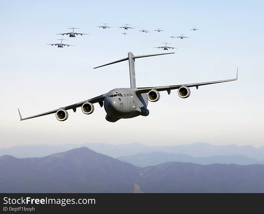 Grey Cargo Plane Flying