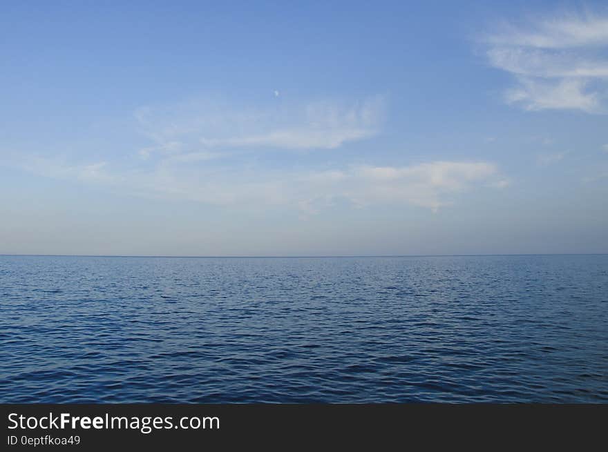 A view of the calm seas with blue skies.