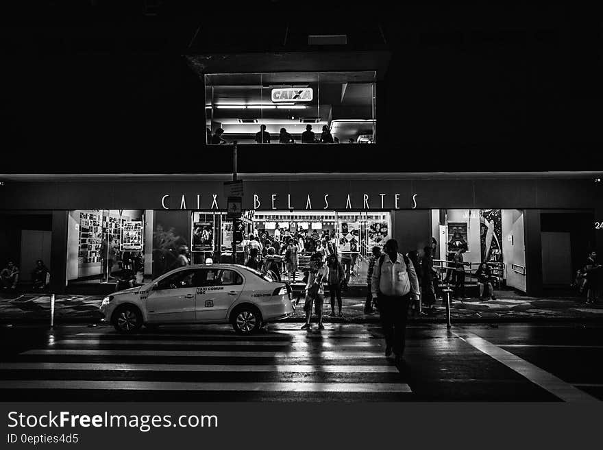 Car Parked on the Street in Grayscale