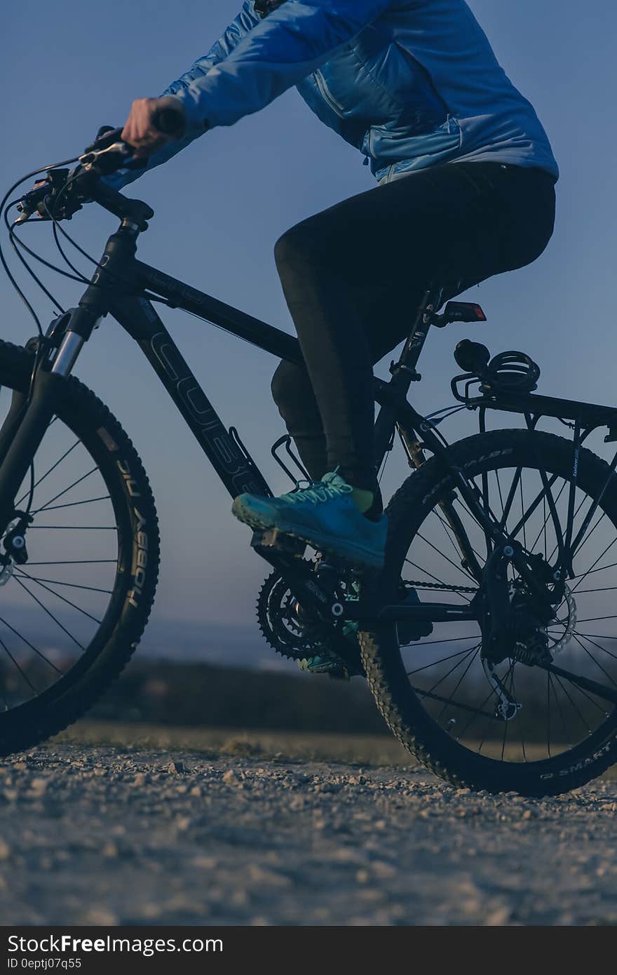 Person Riding on Black Mountain Bike during Night Time