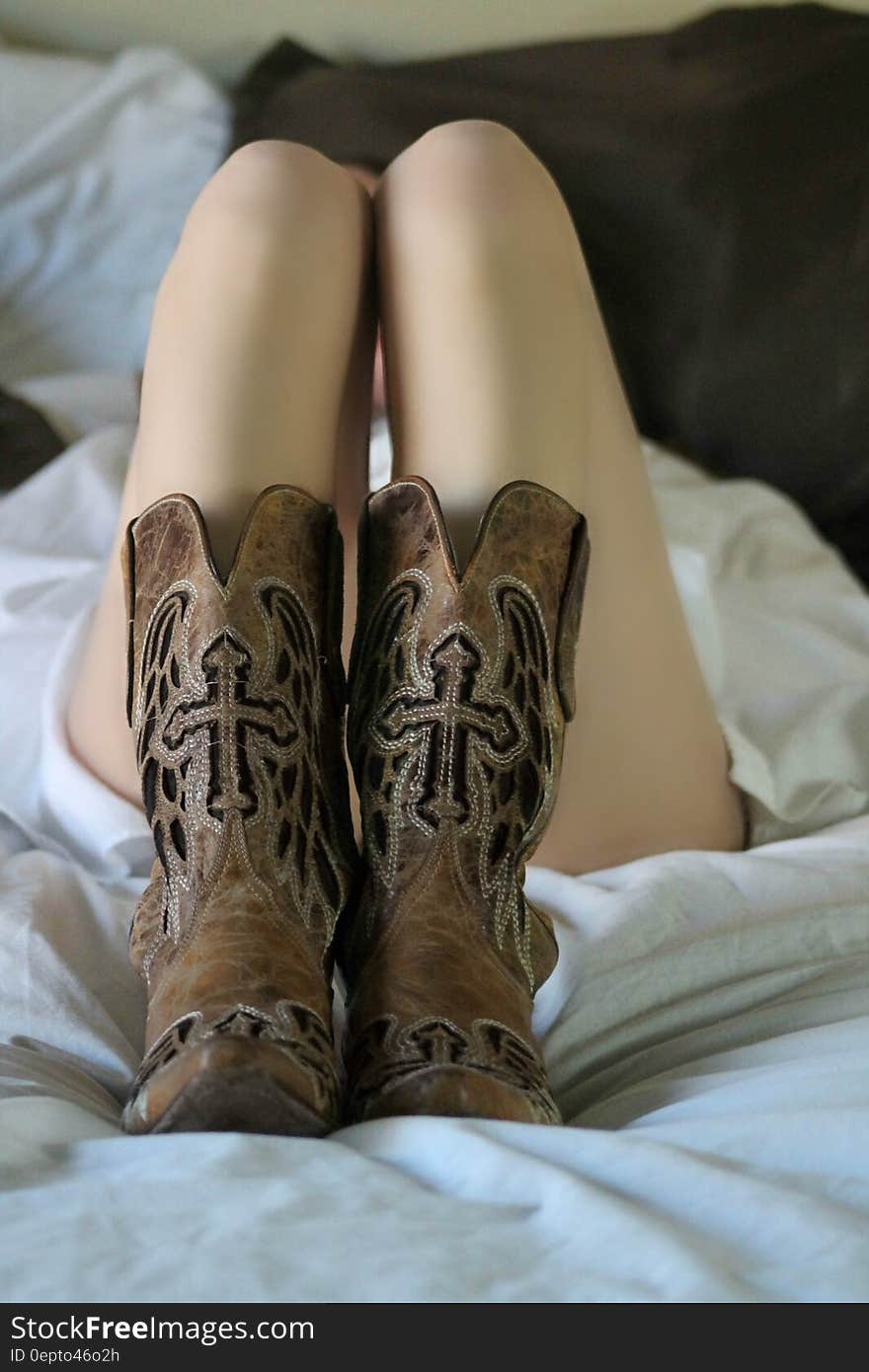 Woman Wearing Brown Leather Boots