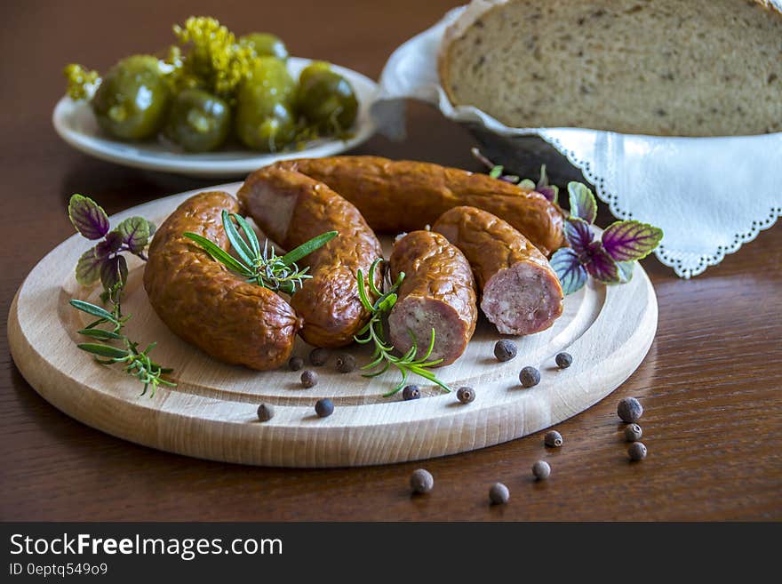 Brown Hotdog on a Brown Plate