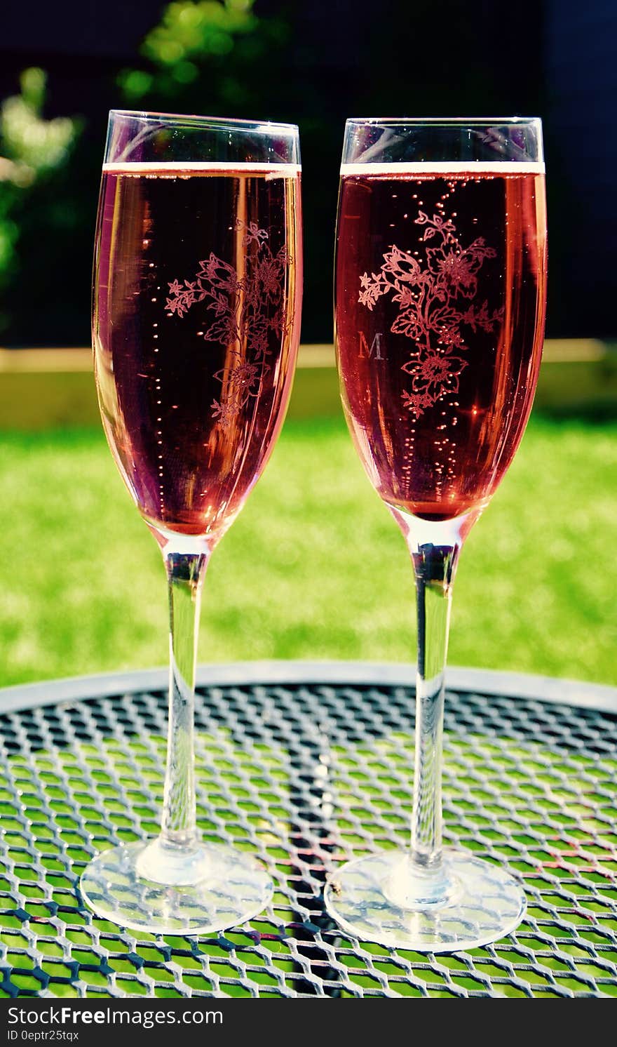 Two Wine Glass on Grey Metal Round Table