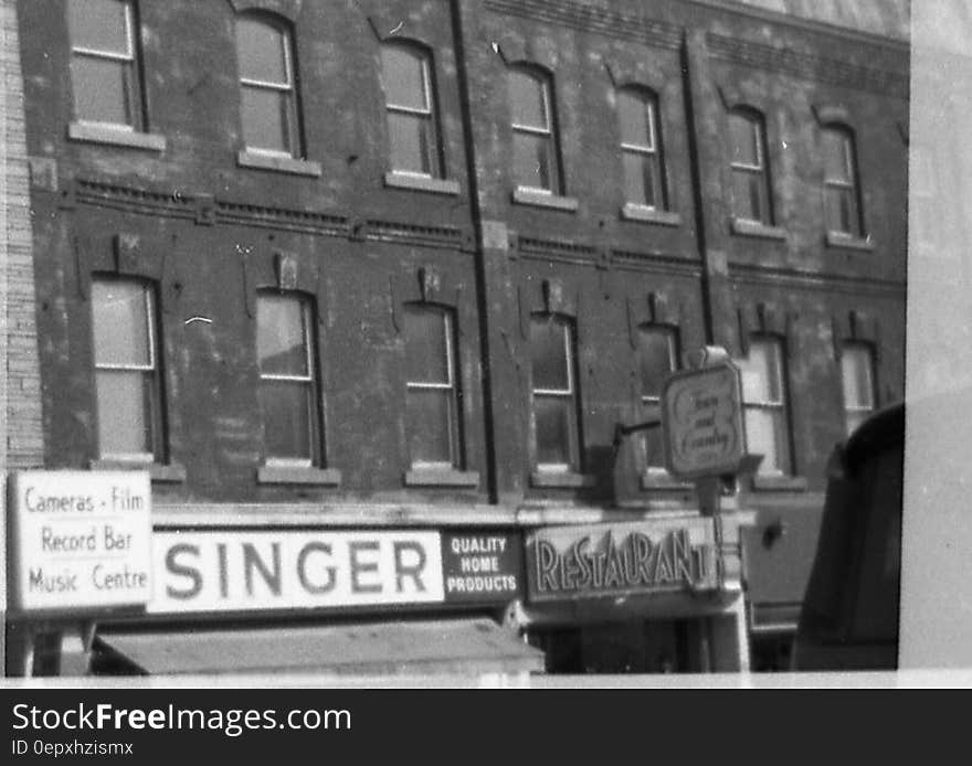 Singer storefront in downtown Belleville circa 1970 in black and white. Singer storefront in downtown Belleville circa 1970 in black and white.